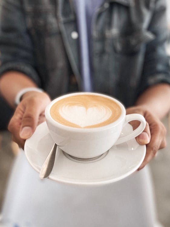 Free Photo Of Person Holding Coffee Stock Photo