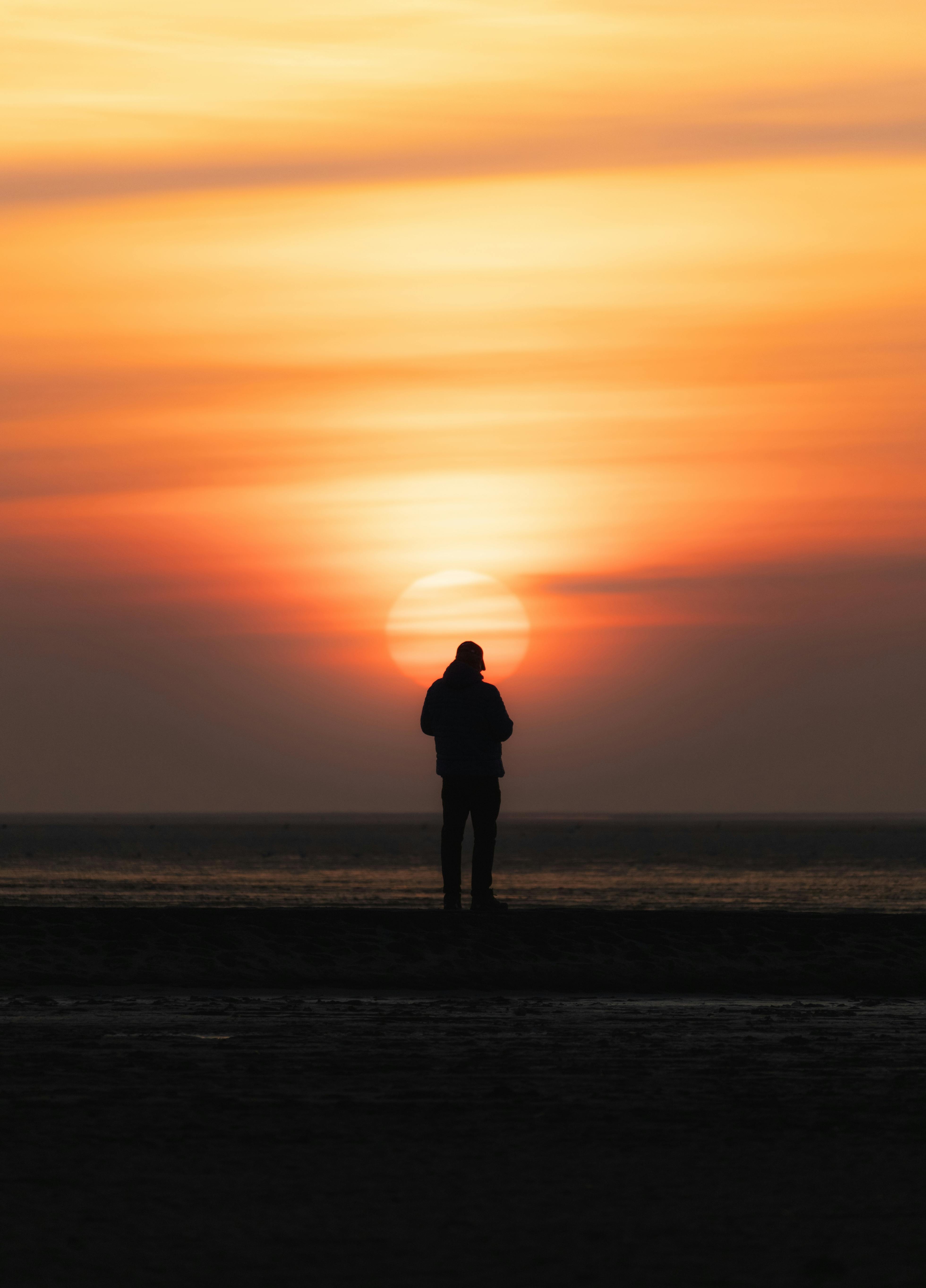 A stunning sunset silhouette at Cuxhaven beach in Niedersachsen, Germany.