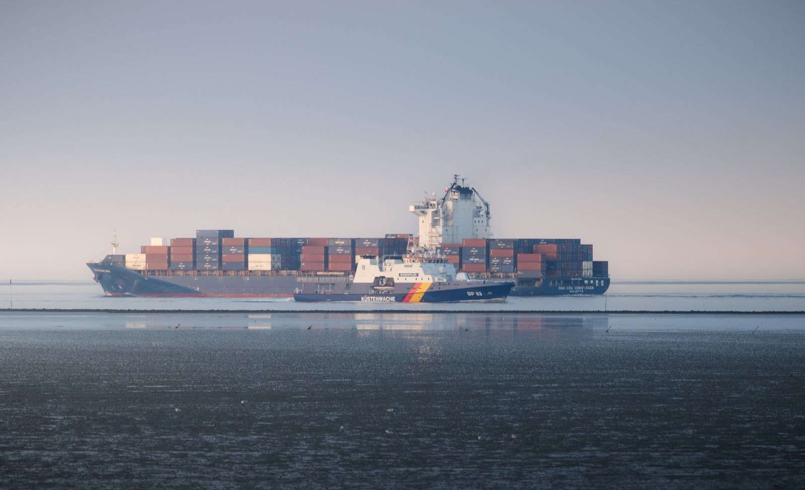 Container ship near Cuxhaven at dawn