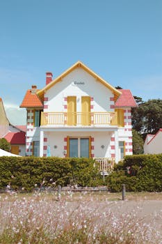 Bright coastal house with colorful accents in Saint-Palais-sur-Mer, France.
