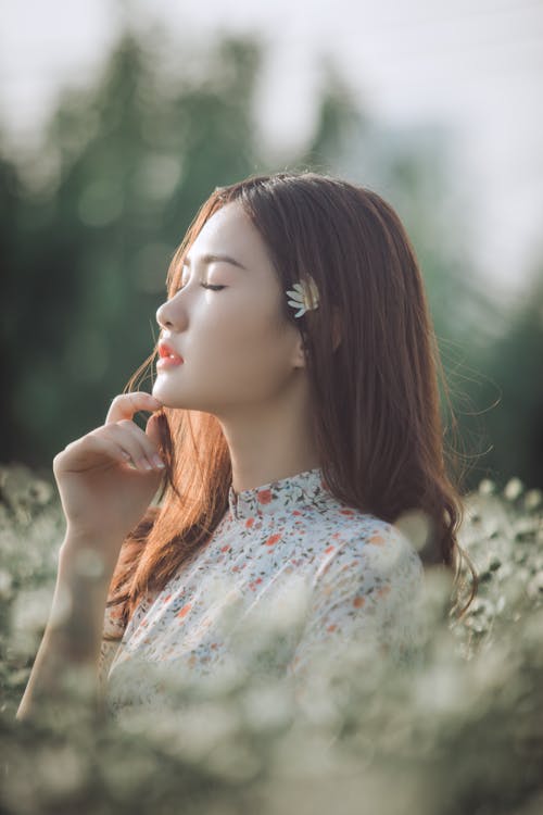 Photo Of Woman Wearing Floral Top