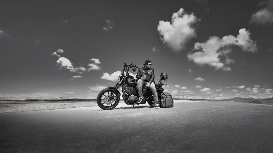 Motorcycle and rider on an open highway
