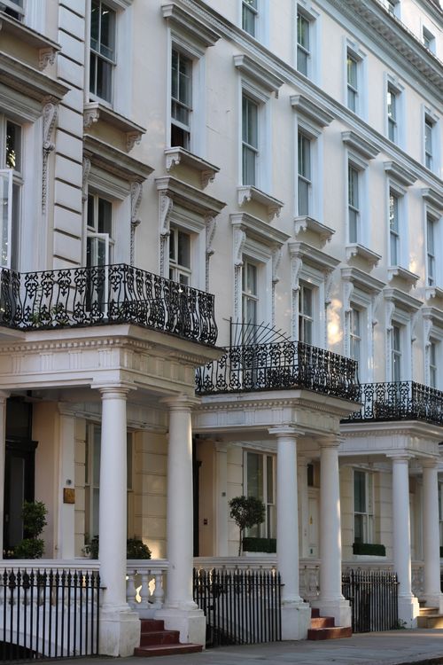 Free Capture of classic Georgian townhouses in London, showcasing elegant windows and ornate balconies. Stock Photo