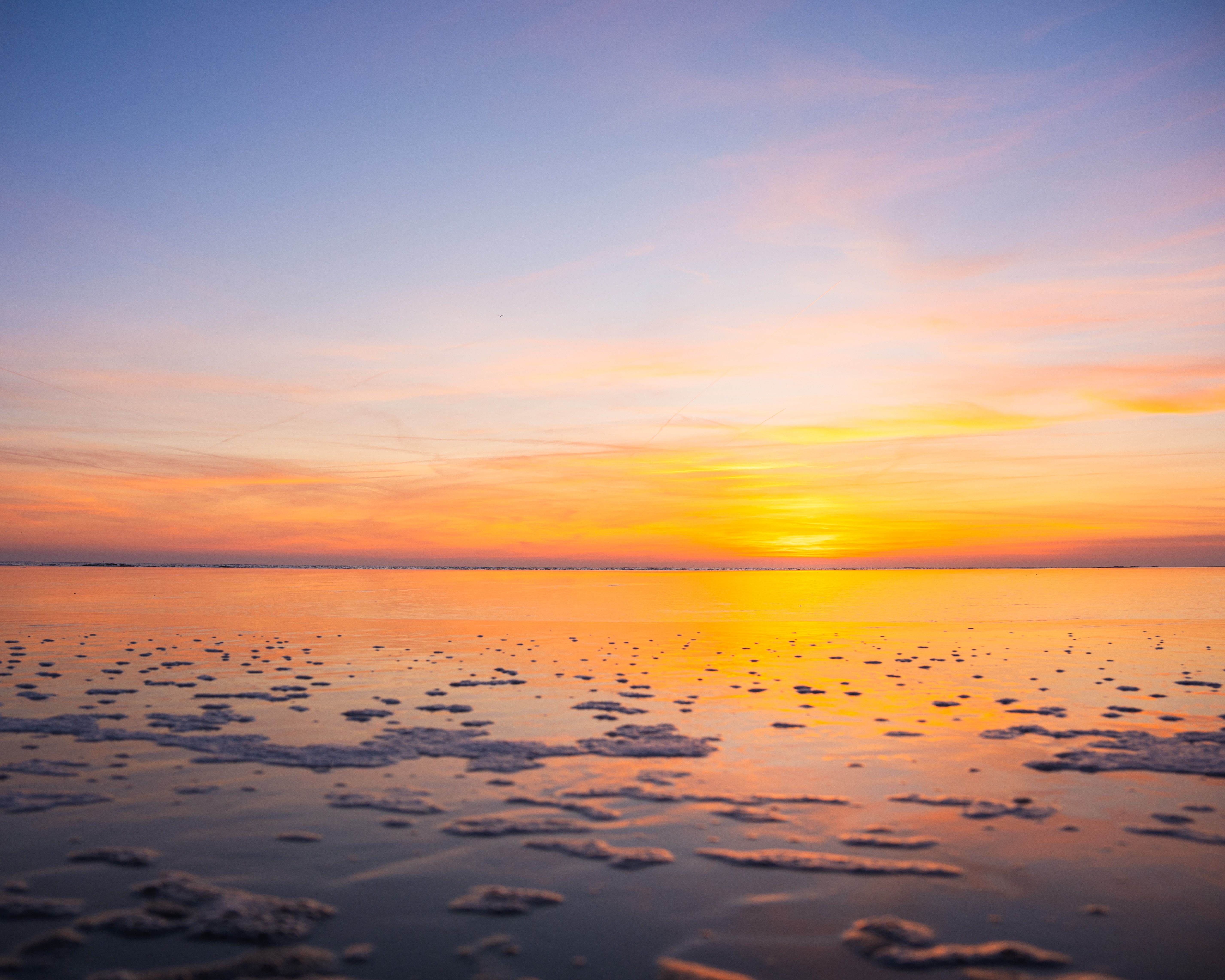 Stunning Sunset Over Calm Ocean Waters · Free Stock Photo