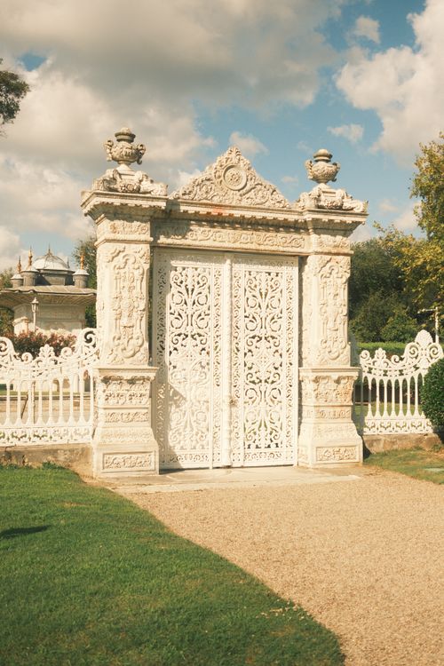 Ornate White Gate in Sunny Park Setting · Free Stock Photo
