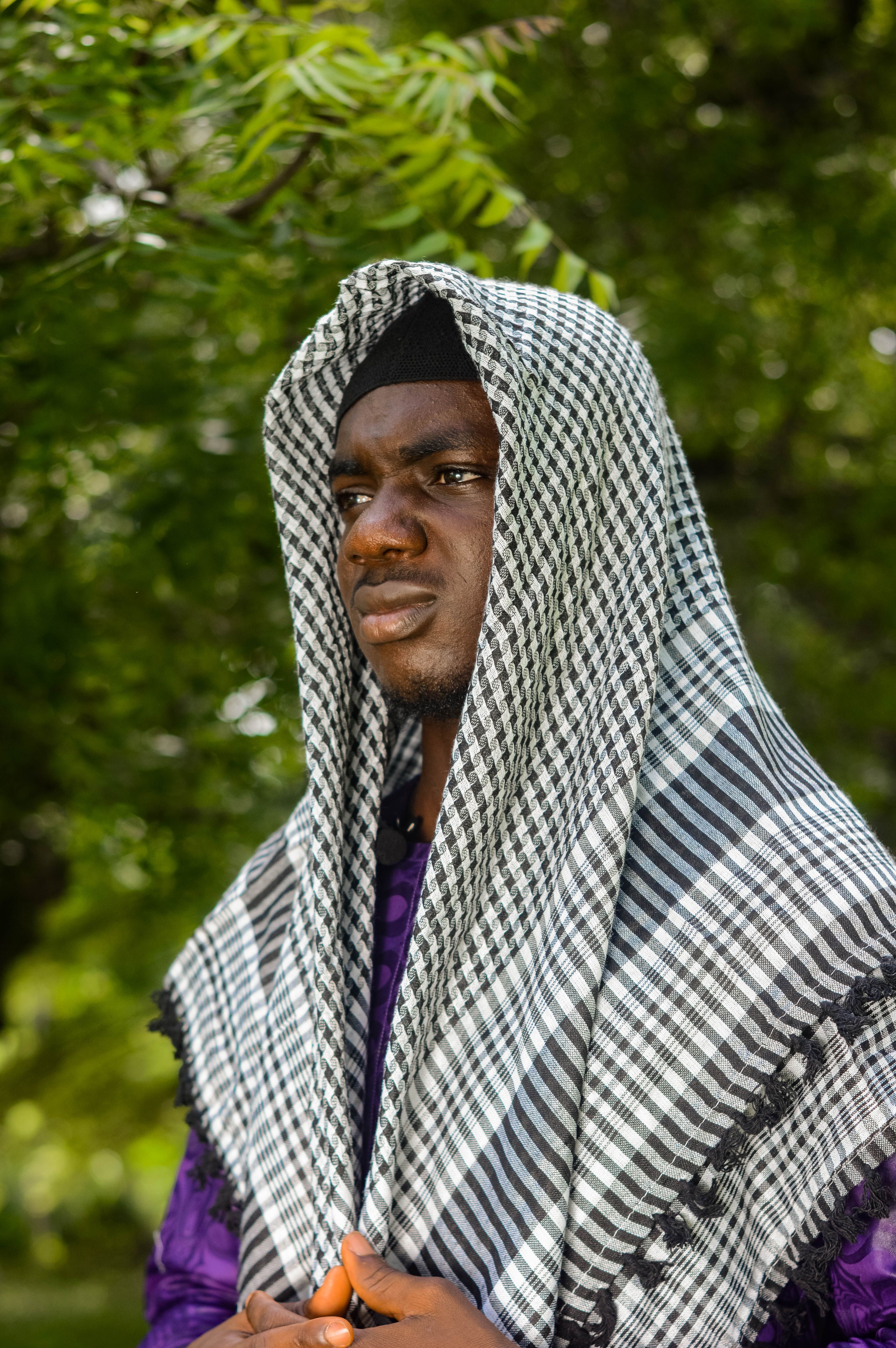 Portrait of Thoughtful Man in Traditional Attire Outdoors · Free Stock ...