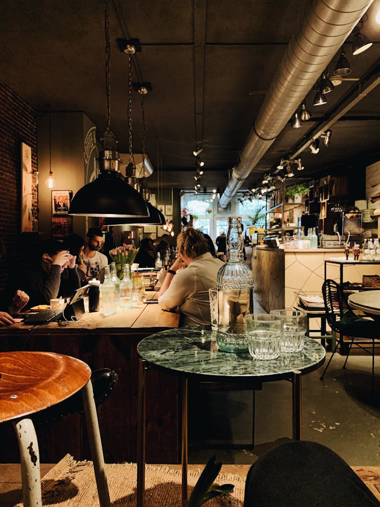 People Sitting Inside A Restaurant