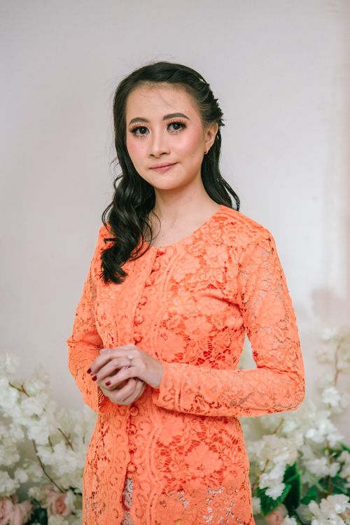 Elegant Woman in Vibrant Lace Dress Portrait · Free Stock Photo
