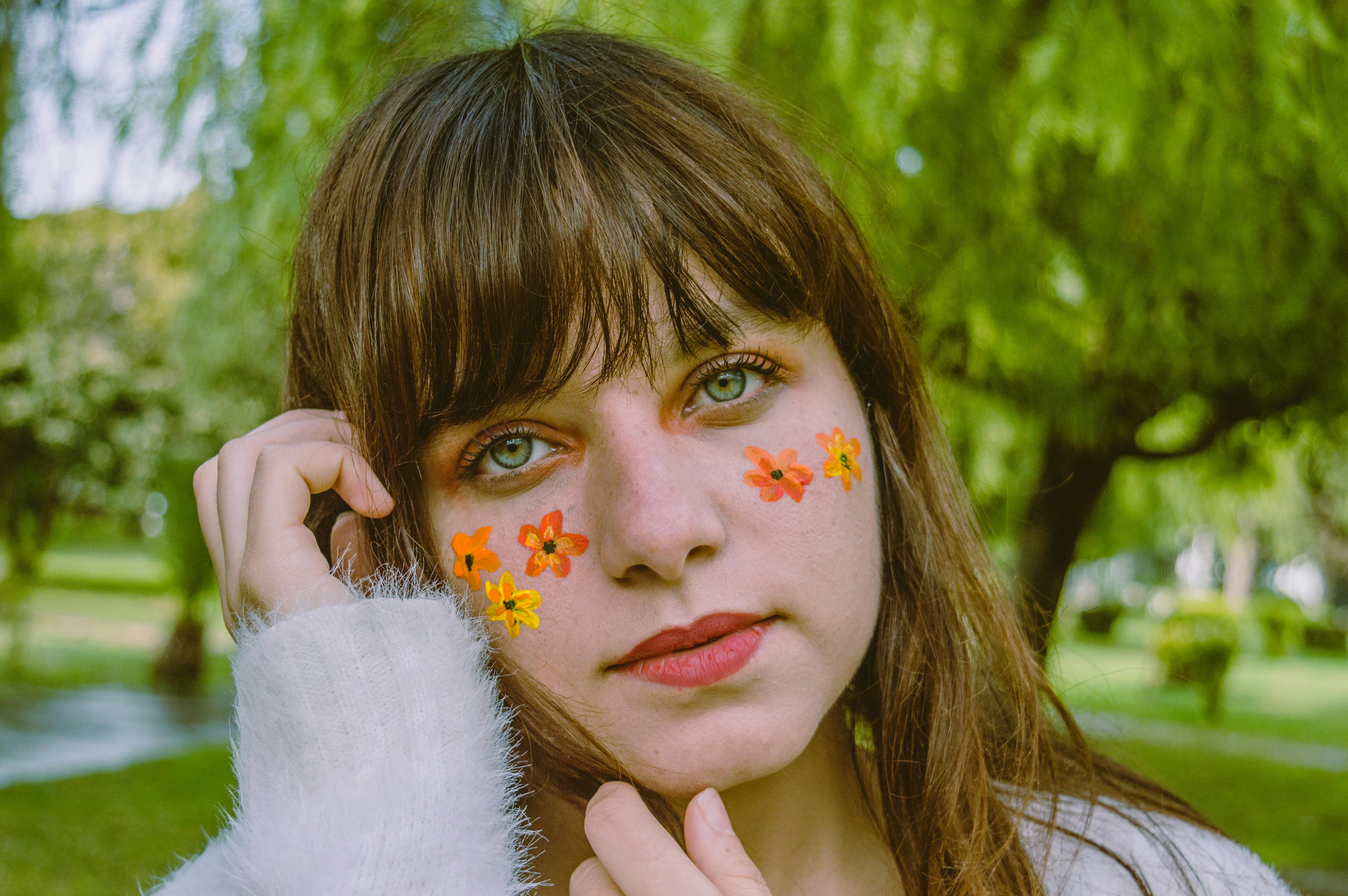 Selective Focus Photography of Woman With Flower Face Paint · Free
