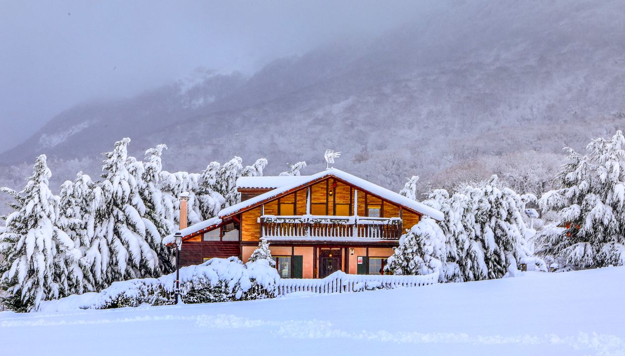 Cozy Wooden Cabin in Snowy Winter Wonderland · Free Stock Photo