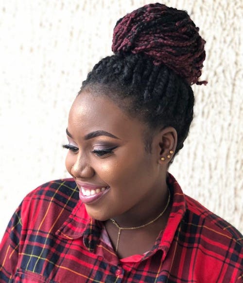 Selective Focus Photography of Smiling Woman Wearing Plaid Collared Top