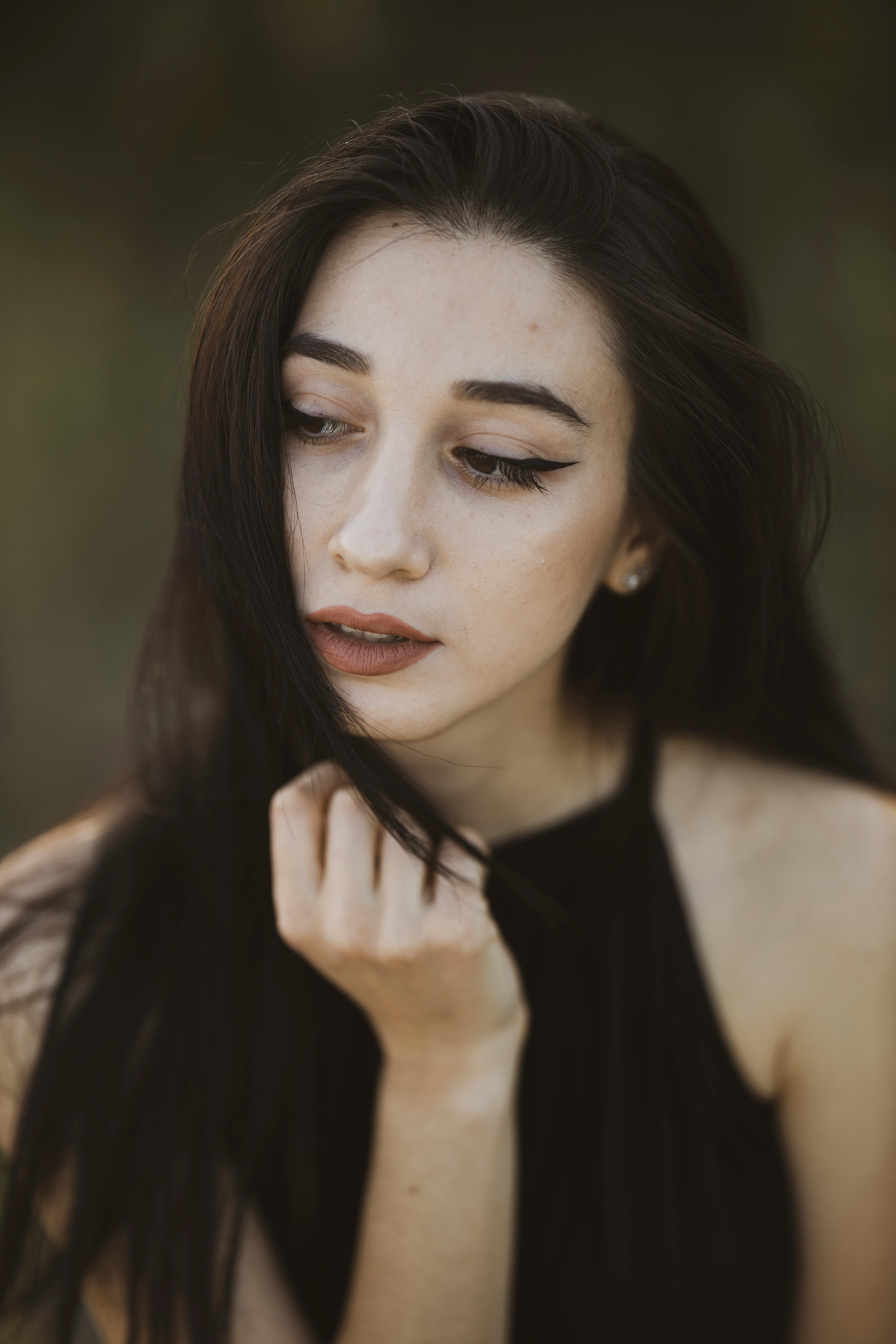 portrait of woman wearing black blouse