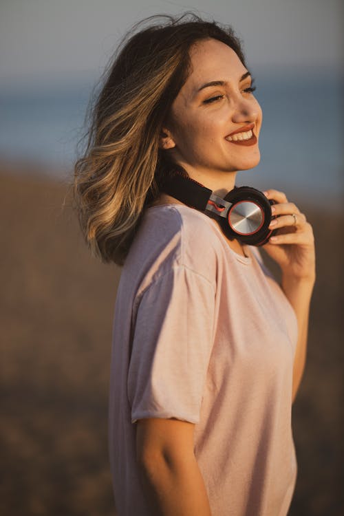 Free Woman Using Headphones Stock Photo
