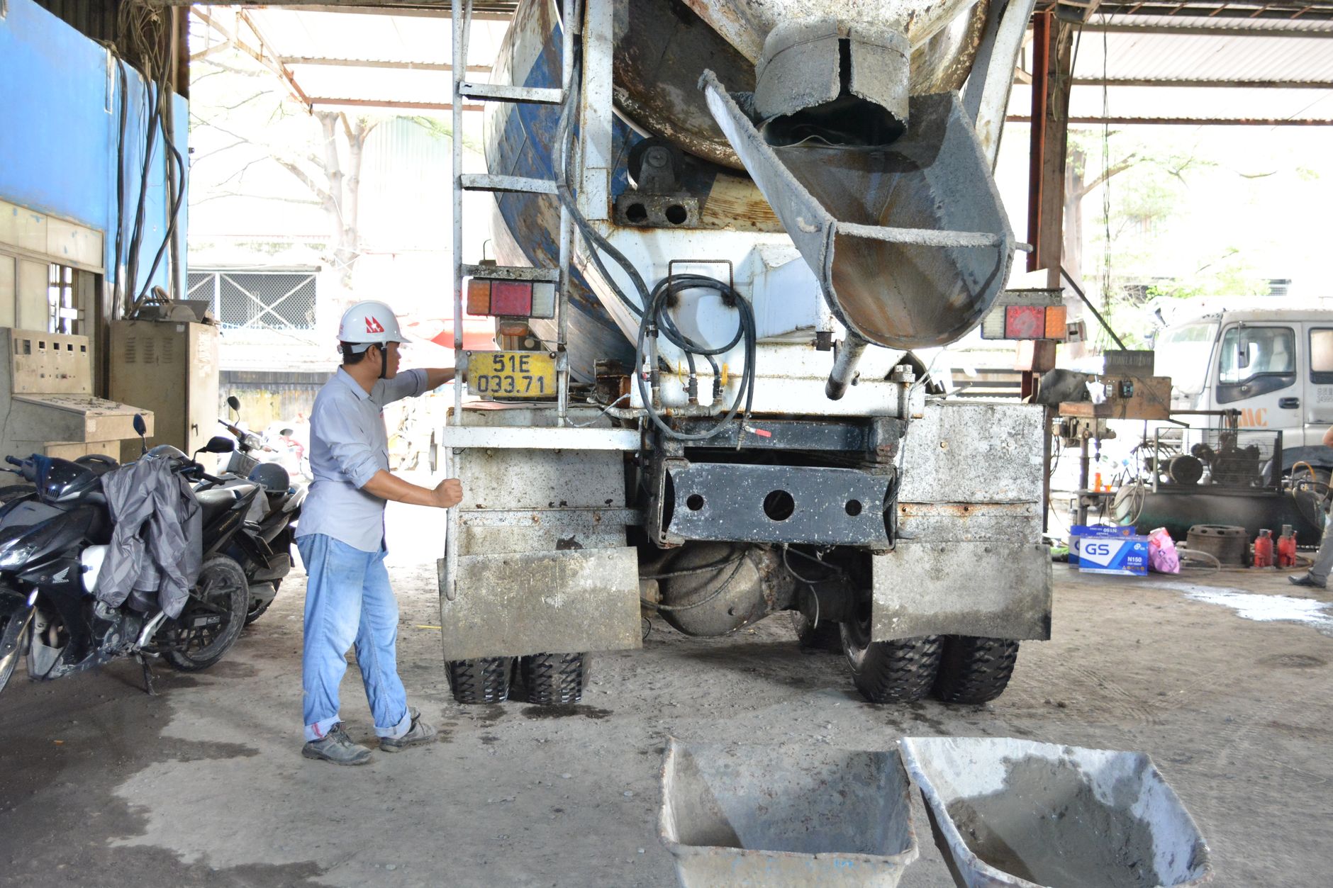 Cómo cambiar la correa de una betonera de volteo