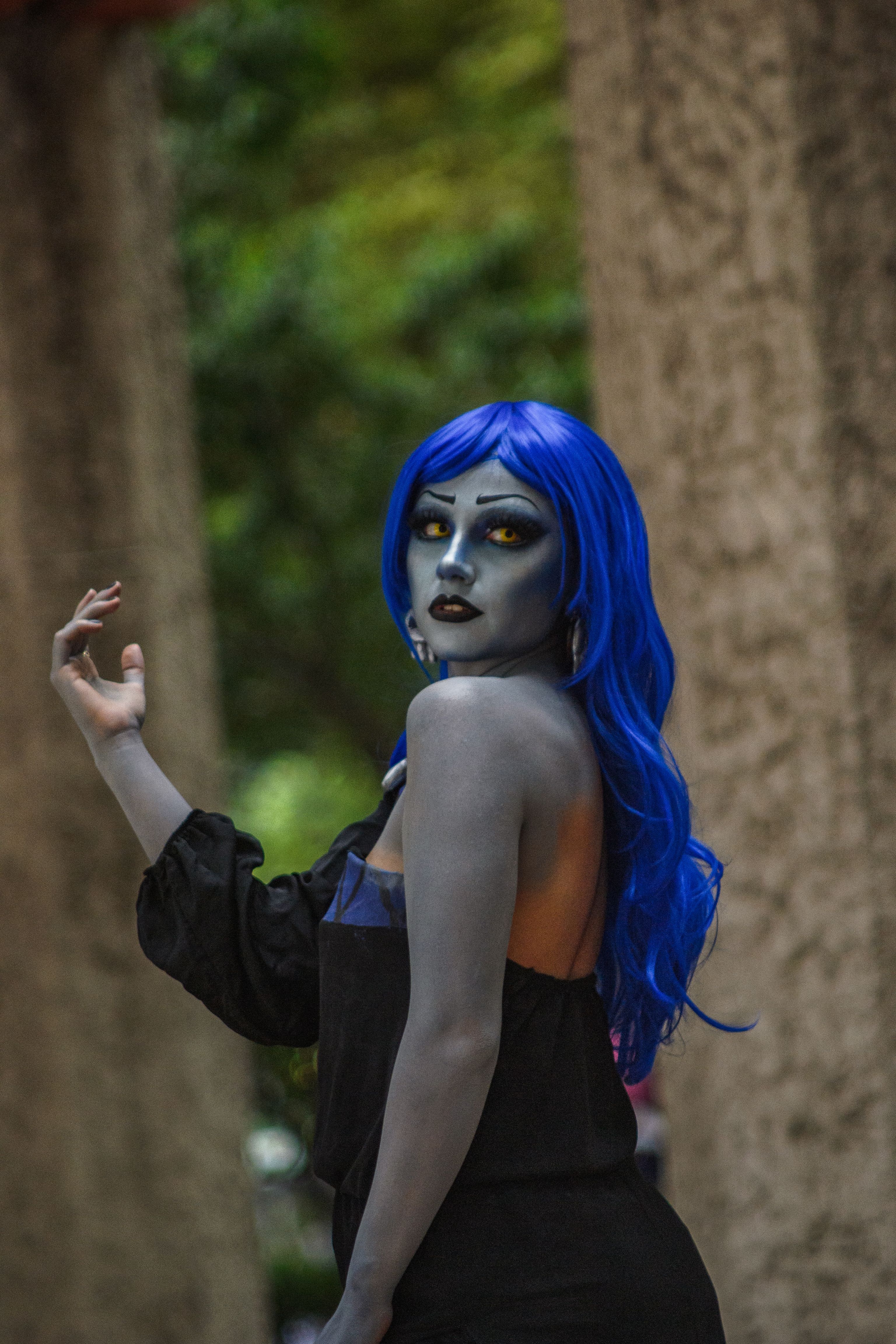 Cosplay Character in Vibrant Blue Wig Outdoors