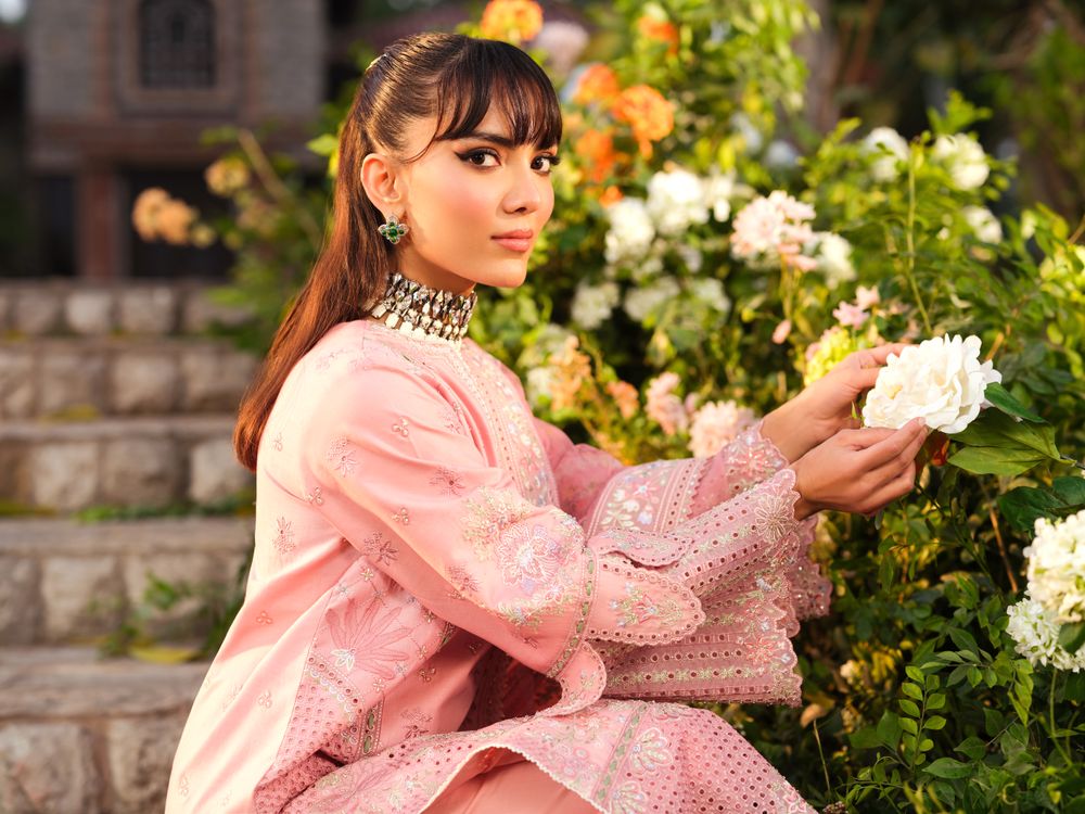 Elegant Woman in Pink Dress with Flowers · Free Stock Photo