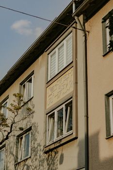Charming building facade in Kassel, Germany captured during golden hour, highlighting vintage urban style.