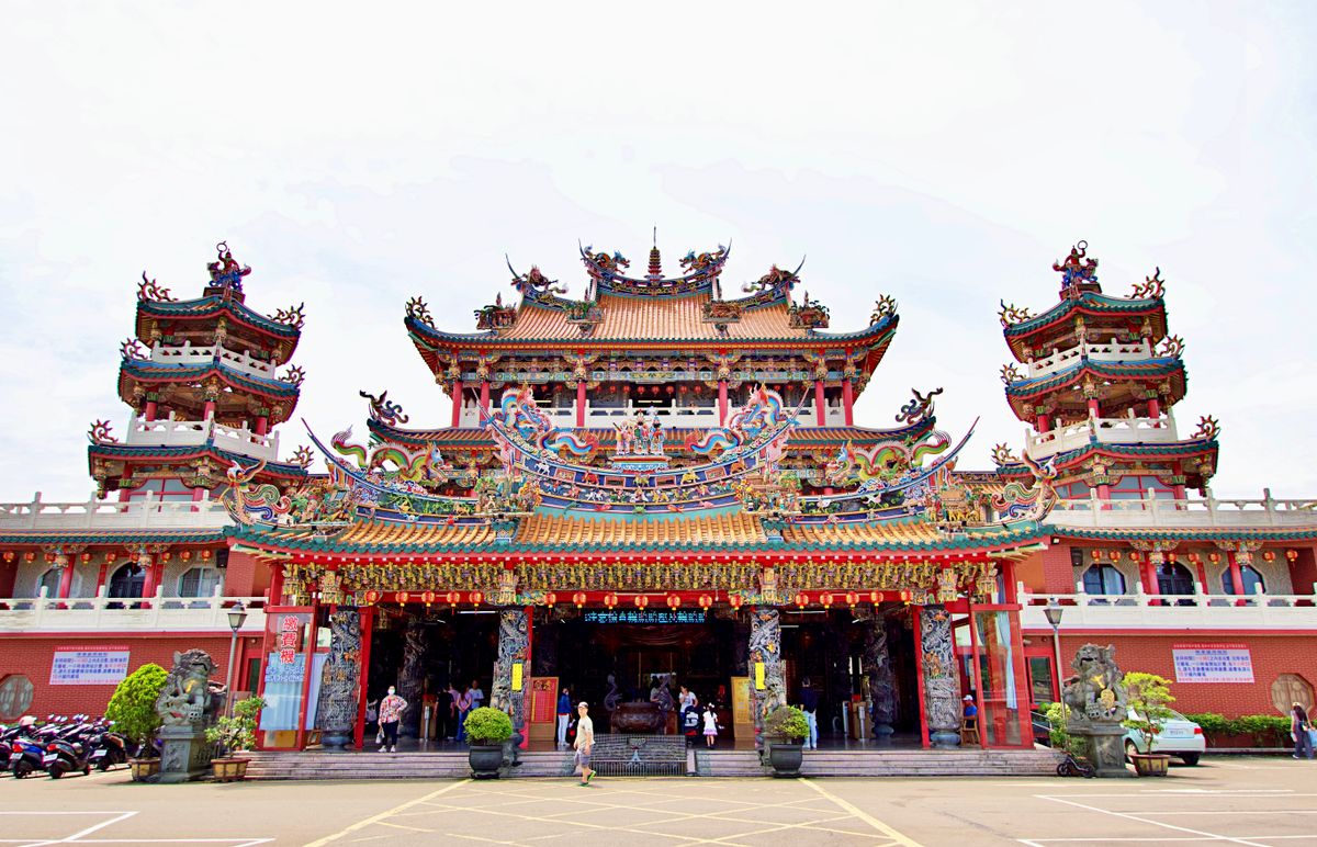 Ornate red and gold rooftop of Wen Wu Temple overlooking Sun Moon Lake