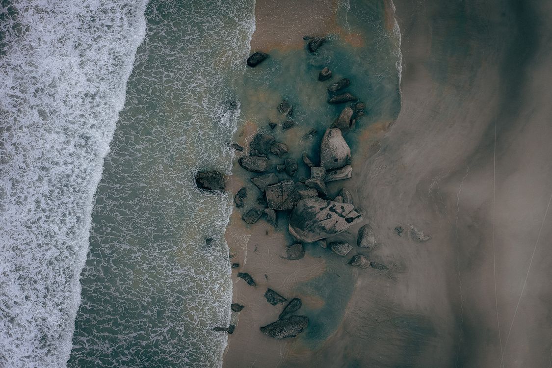 Rocks on a Beach · Free Stock Photo
