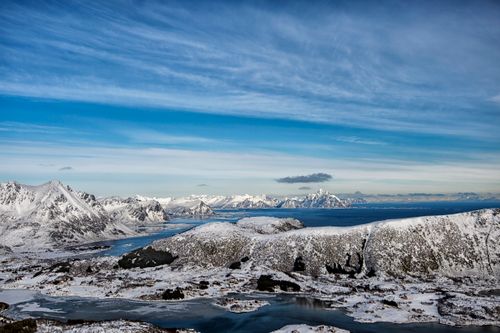Free Breathtaking view of snow-covered mountains and fjords in Lofoten, Norway during winter. Stock Photo