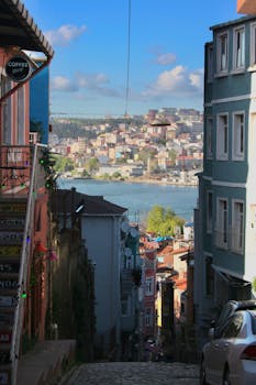 Picturesque street view in Istanbul with Bosphorus backdrop on a sunny day.