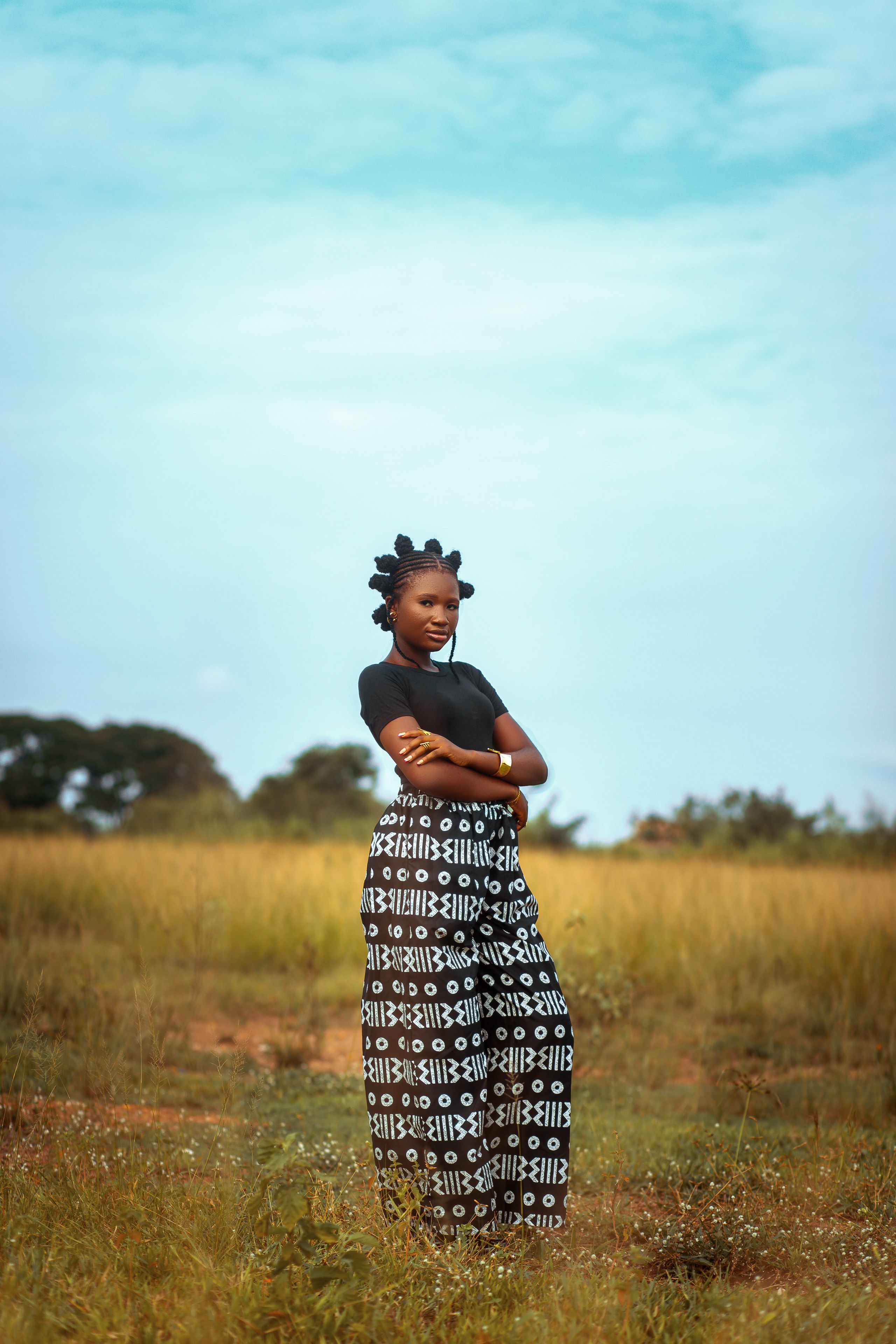 Young Woman in Traditional African Attire Outdoors
