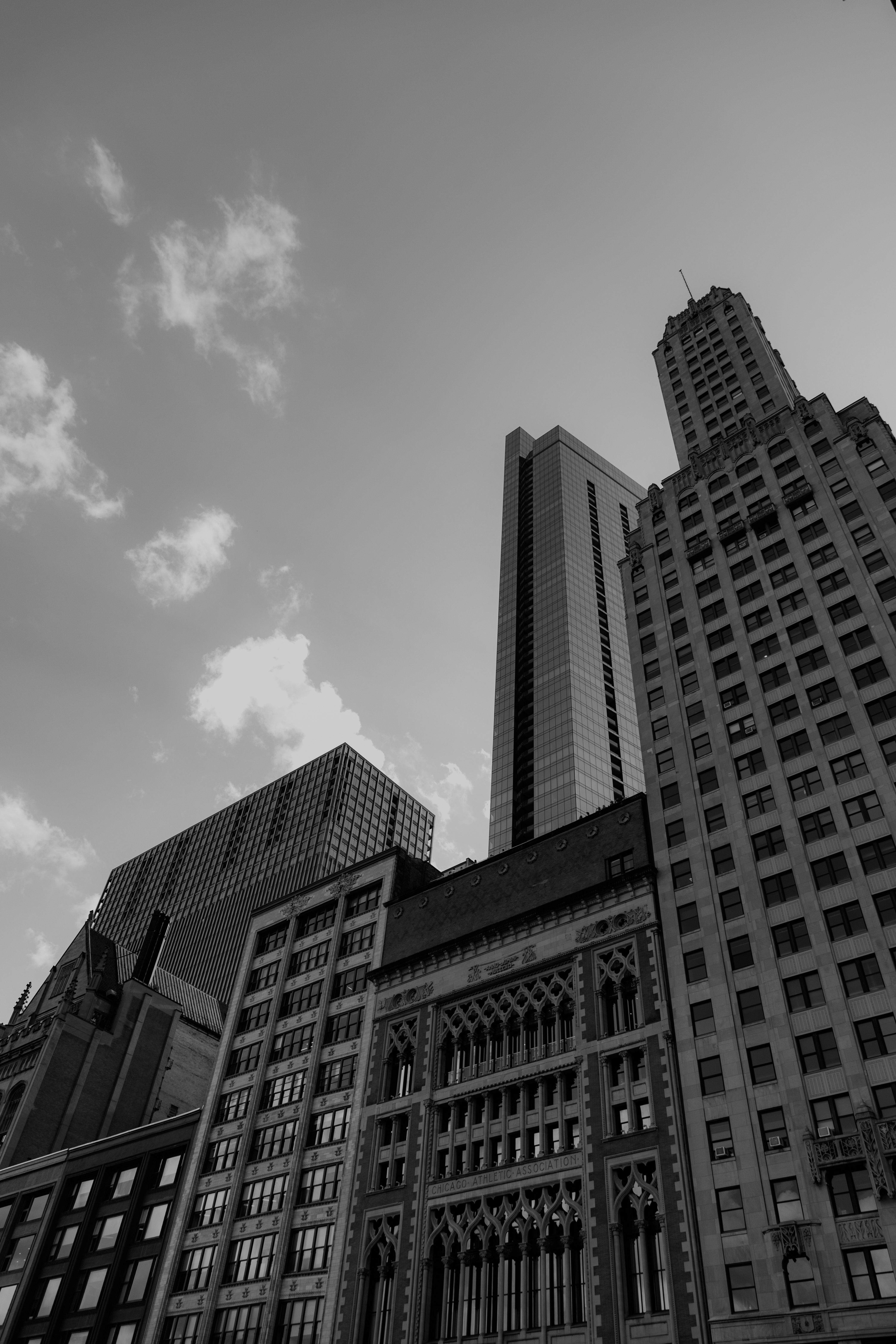 Dramatic black-and-white view of Chicago Art Deco skyscrapers, echoing The Robey's 1929 tower in Bucktown