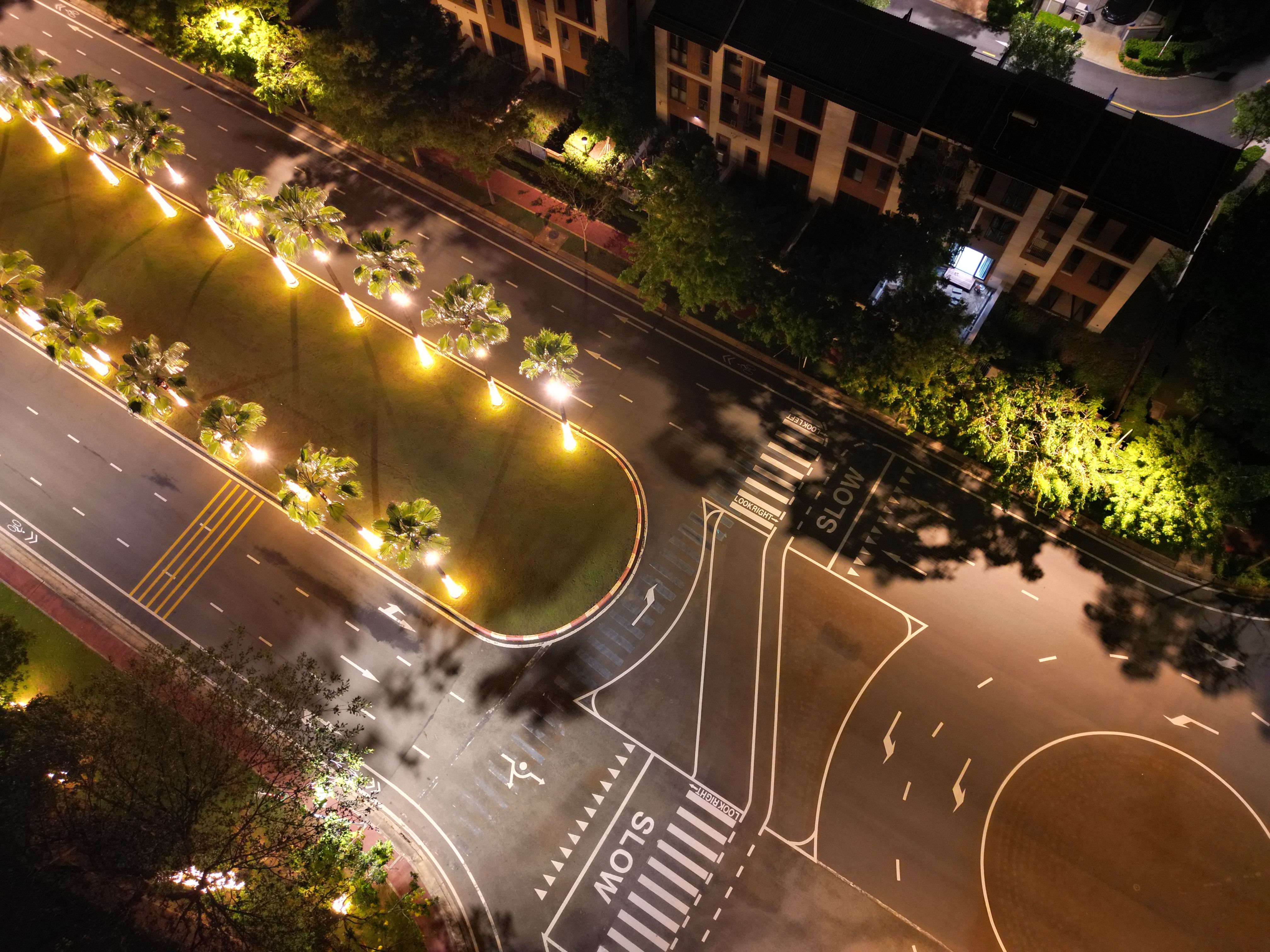 Aerial View of Illuminated Urban Road at Night · Free Stock Photo