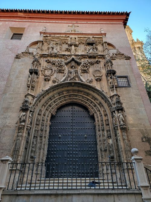 Free Gothic-style portal of Santiago Church, Málaga, showcasing intricate carvings. Stock Photo