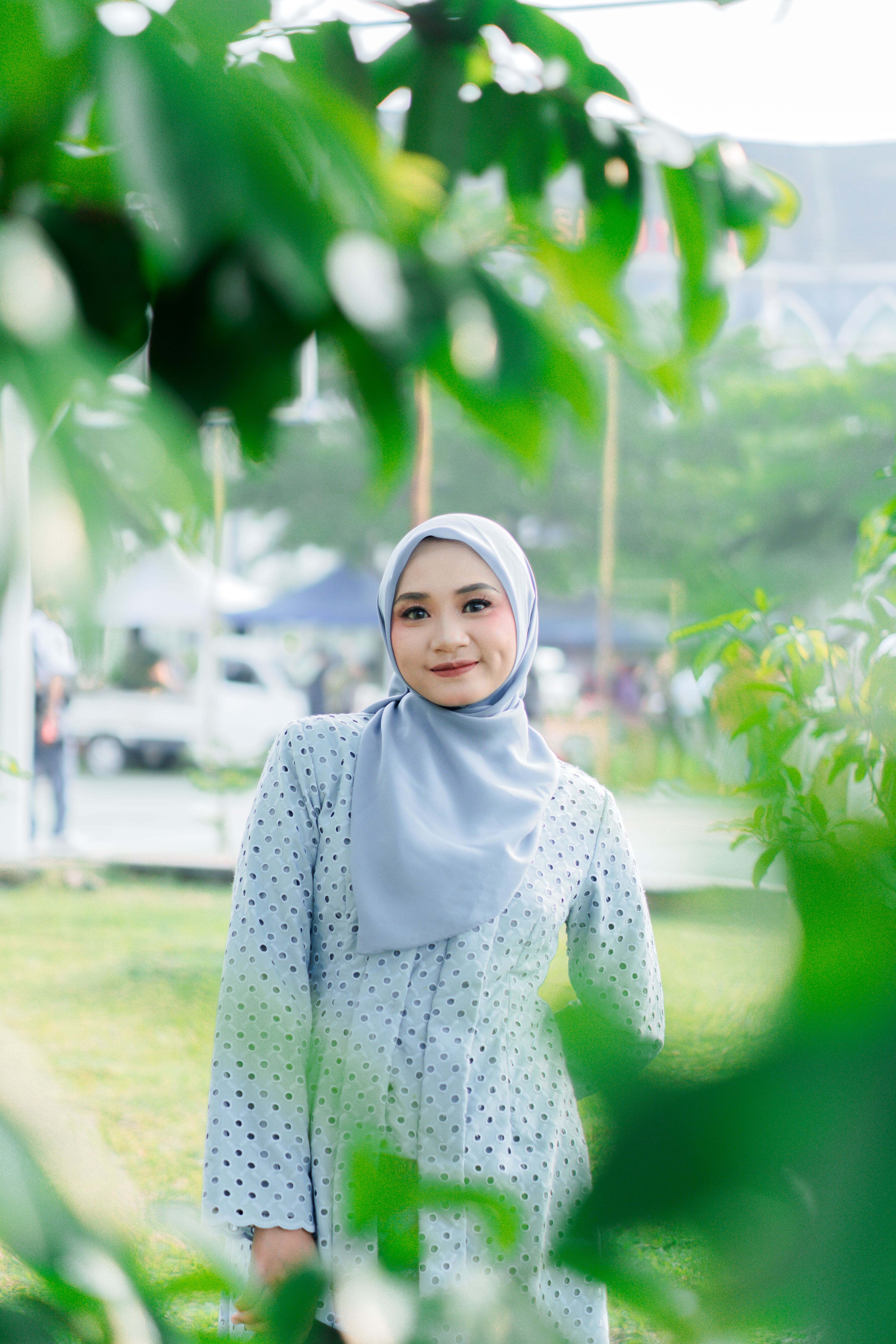 Portrait of Woman in Polka Dot Dress Outdoors · Free Stock Photo