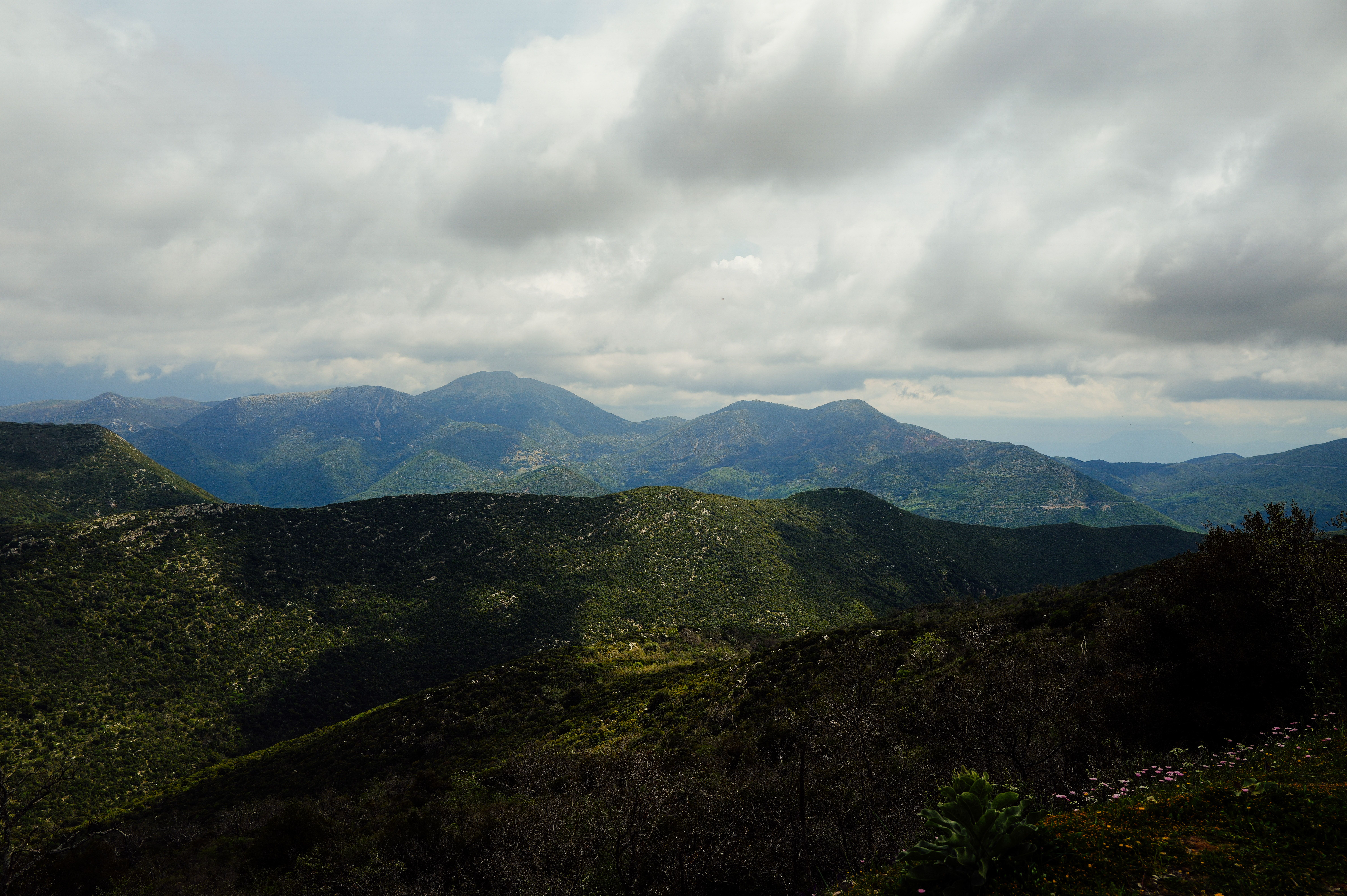 Scenic Mountain Landscape Under Cloudy Sky · Free Stock Photo