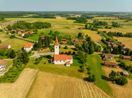 Free Scenic aerial shot of Velika Trnovitica village in Croatia's countryside on a sunny day. Stock Photo