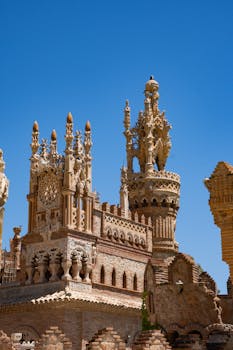 Stunning view of Castillo de Colomares under clear blue skies in Benalmádena, Spain.