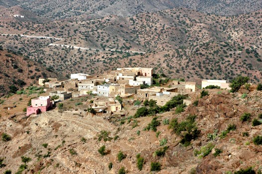 Aerial view of a traditional village nestled in the Tafraoute mountains, Morocco.