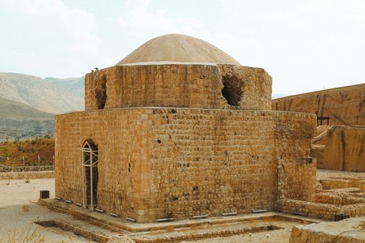 Historic stone building in Hasankeyf, Turkey, showcasing ancient architecture.