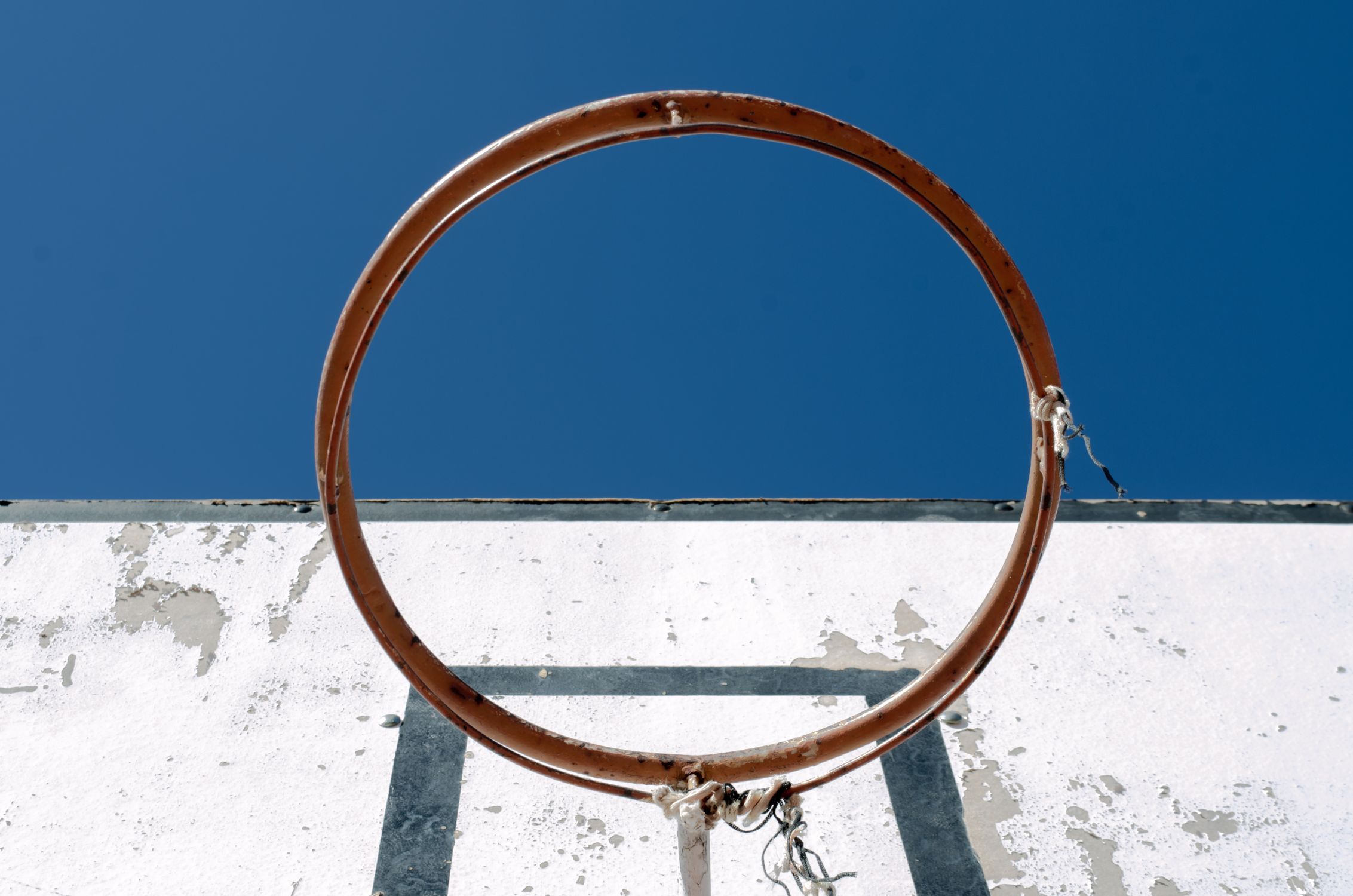Basketball Rustic Rim Rustic Basketball Hoop Against Blue Sky · Free Stock Photo