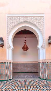 Stunning Moroccan architecture featuring an ornate archway and intricate mosaic tiles.