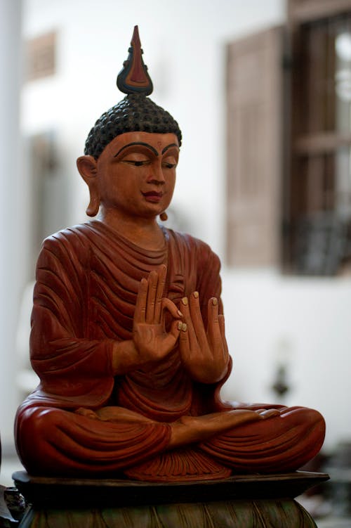 Free Meditating Buddha Figurine Stock Photo