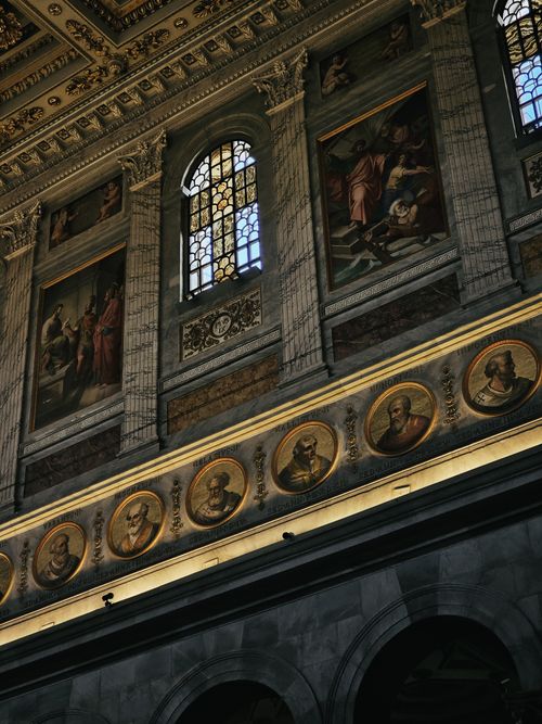 Free Explore the ornate interior of a historic Roman church featuring stunning religious art and architecture. Stock Photo