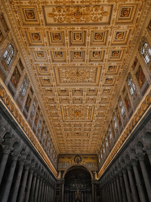 Free Explore the stunning ceiling art of an ancient basilica in Rome, showcasing historic Roman architecture. Stock Photo