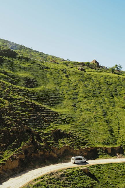 A tranquil drive through the lush green hills of Dagestan, Russia, showcasing natural beauty and serene landscapes.