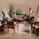 Red Hammock Between Wall