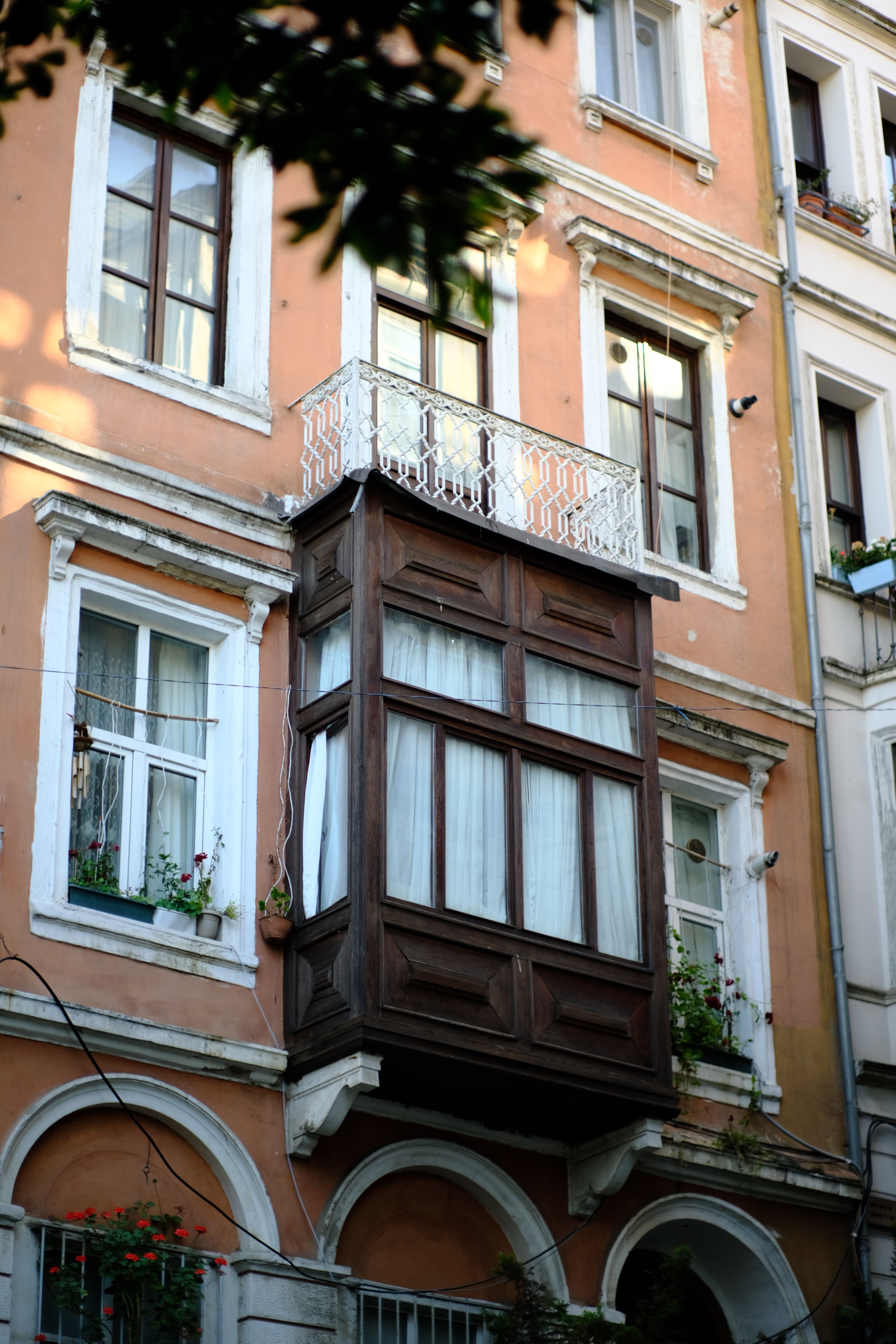 Historic Apartment Building with Wooden Bay Window · Free Stock Photo
