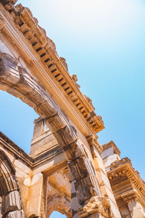 Free Explore the well-preserved ruins of Ephesus with bright skies highlighting the ancient architecture. Stock Photo