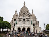 Sacre-Coeur Basilica with Tourists in Paris