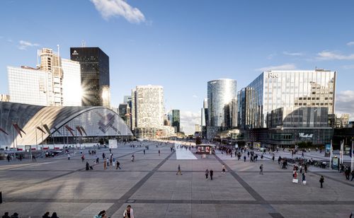 Free View of modern skyscrapers in La Défense district, Paris, on a sunny day. Stock Photo