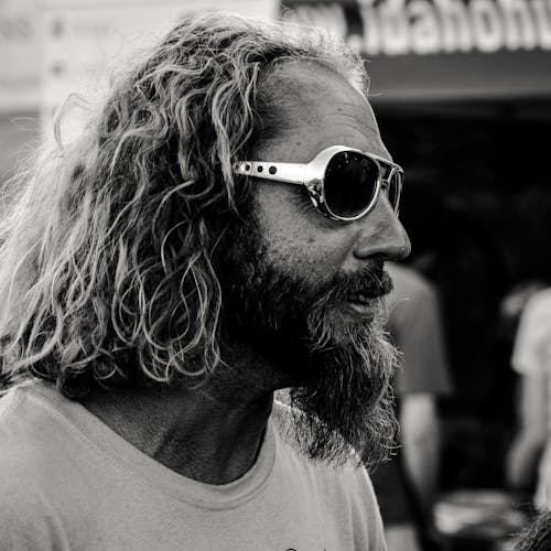 Grayscale Photography of Man Wearing Sunglasses