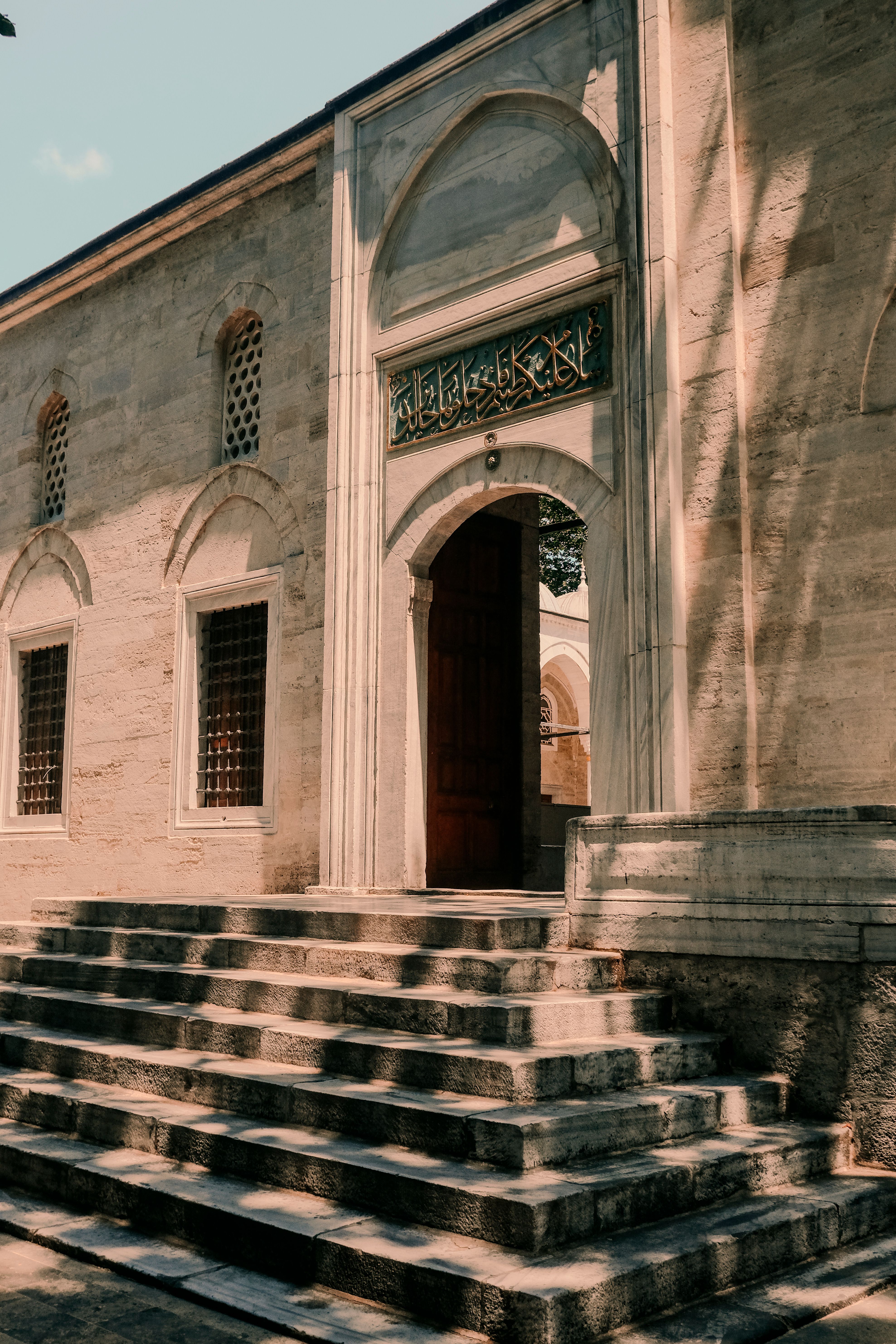 Historic Mosque Entrance in Istanbul with Stone Steps · Free Stock Photo