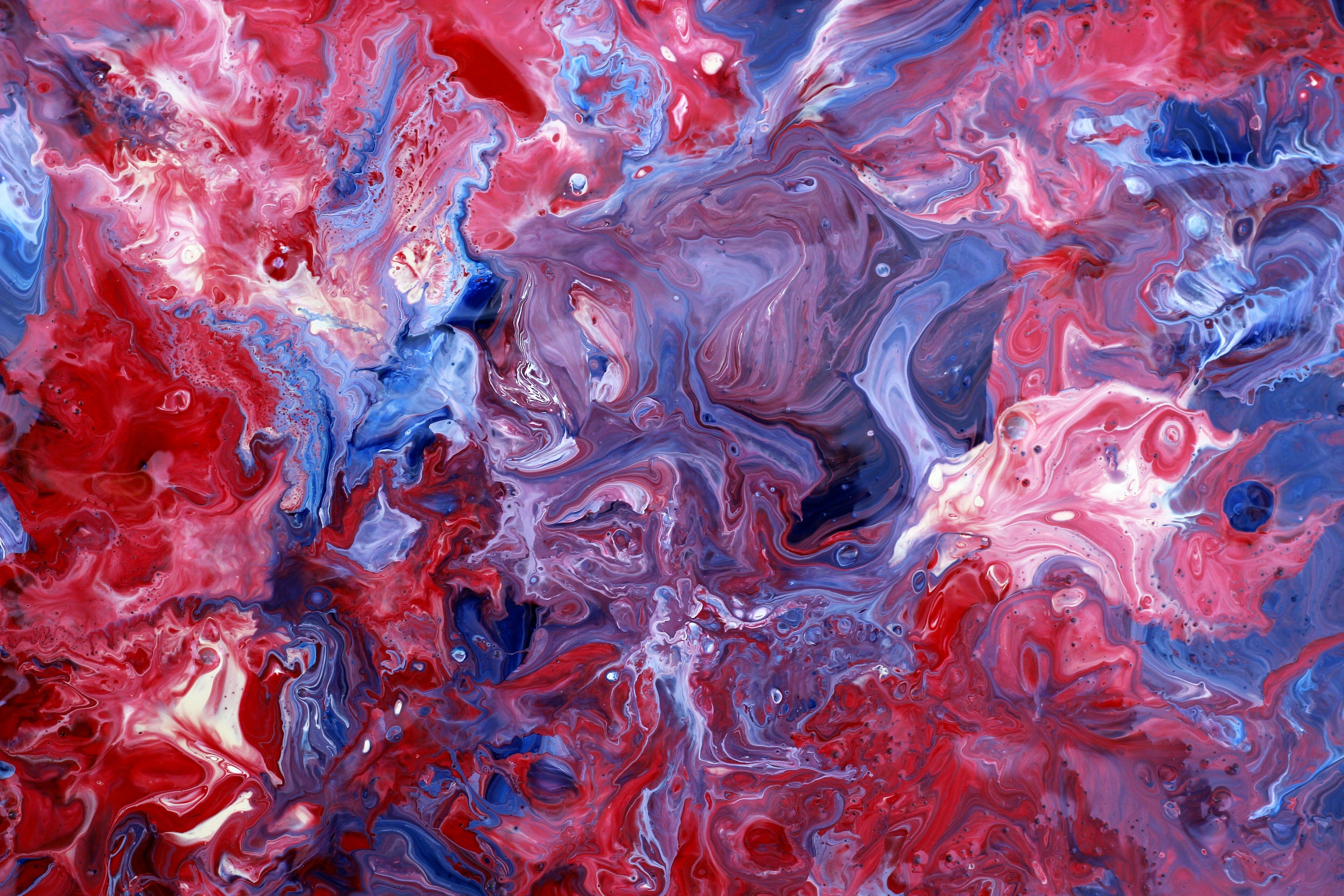 Vibrant Abstract Paint Swirl in Red and Blue · Free Stock Photo