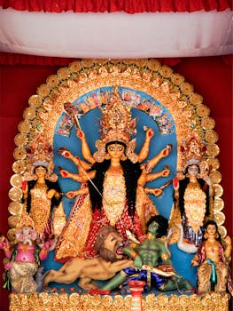 Colorful Durga sculpture during Kolkata's Durga Puja festival, showcasing traditional Indian art.